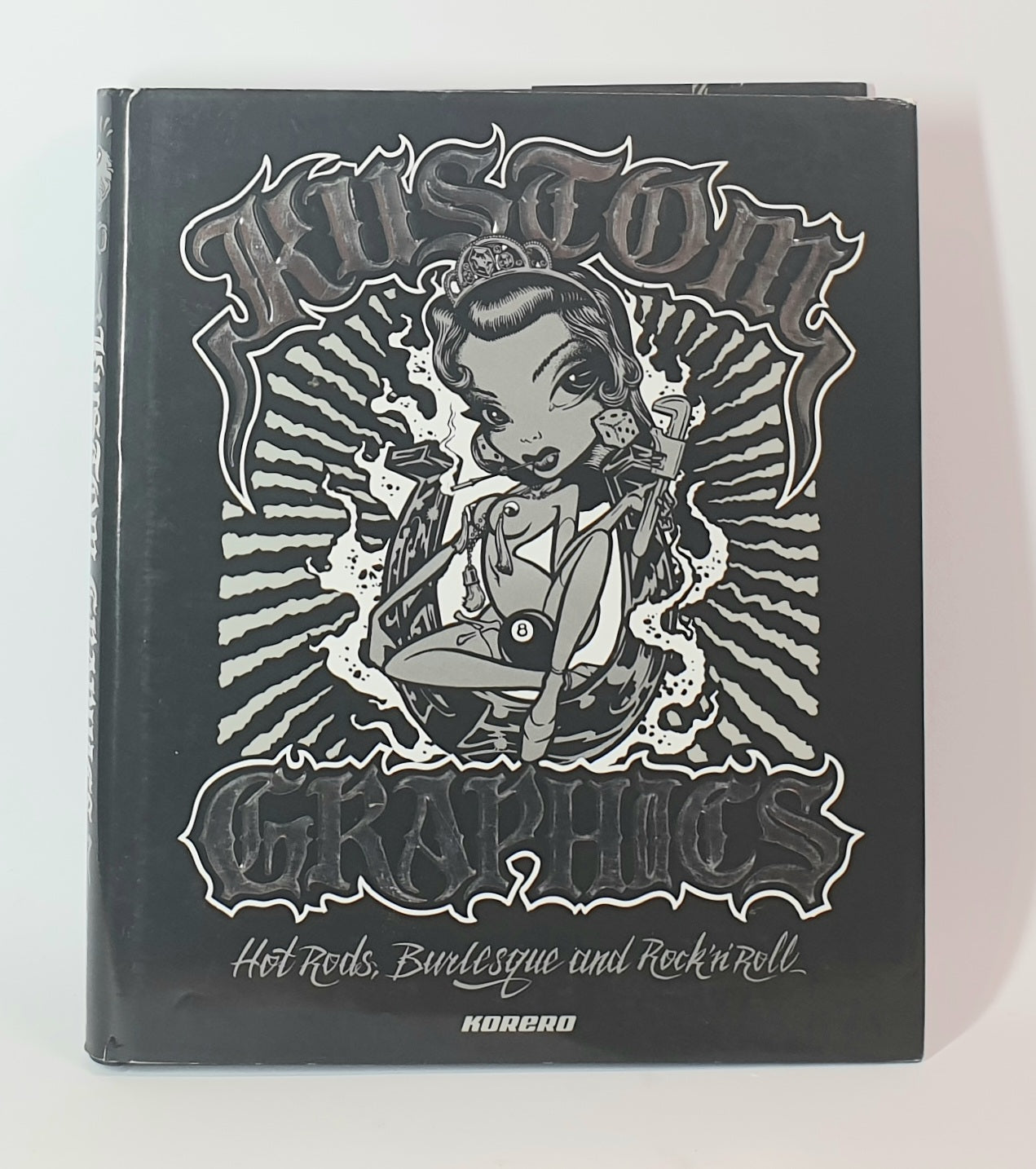 Book titled 'Kustom Graphics' with a graphic design on the cover