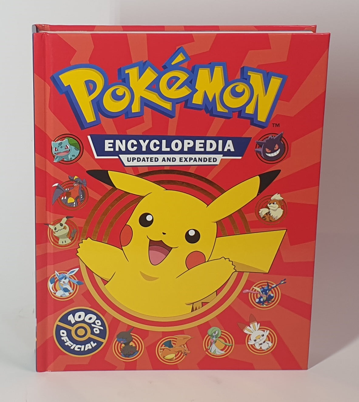 Pokémon Encyclopedia book with Pikachu on a red background