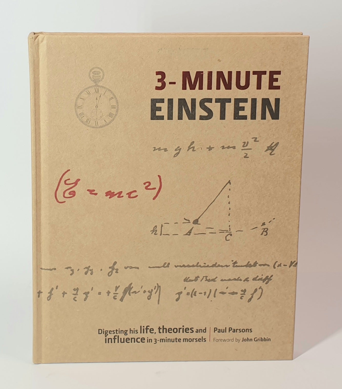 Book titled '3-Minute Einstein' with mathematical equations on a beige background
