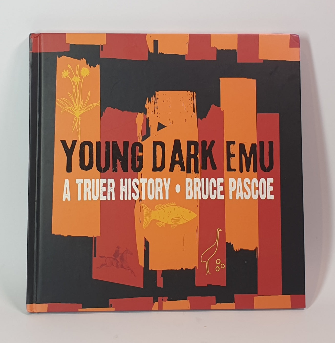 Book titled 'Young Dark Emu: A Truer History' by Bruce Pascoe with abstract design on cover