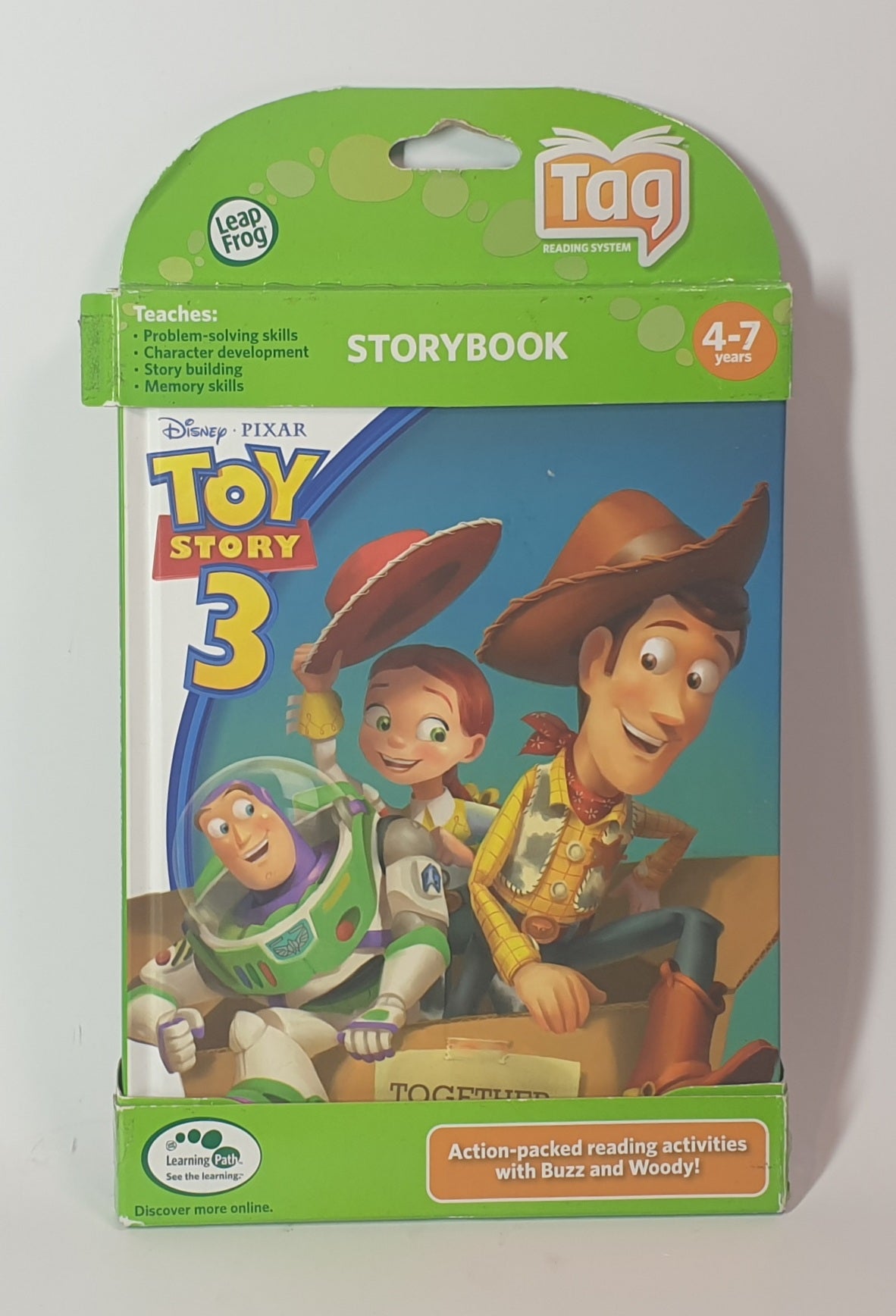 Packaged 'Toy Story 3' storybook with characters Woody and Buzz Lightyear on a white background
