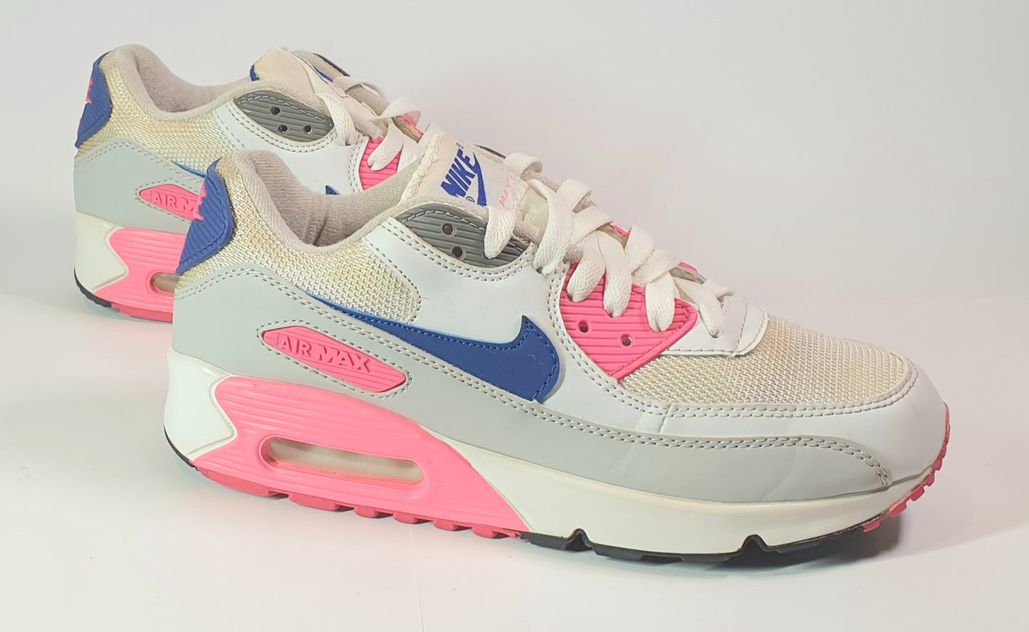 Nike Air Max 90 sneakers in a white, blue, and pink