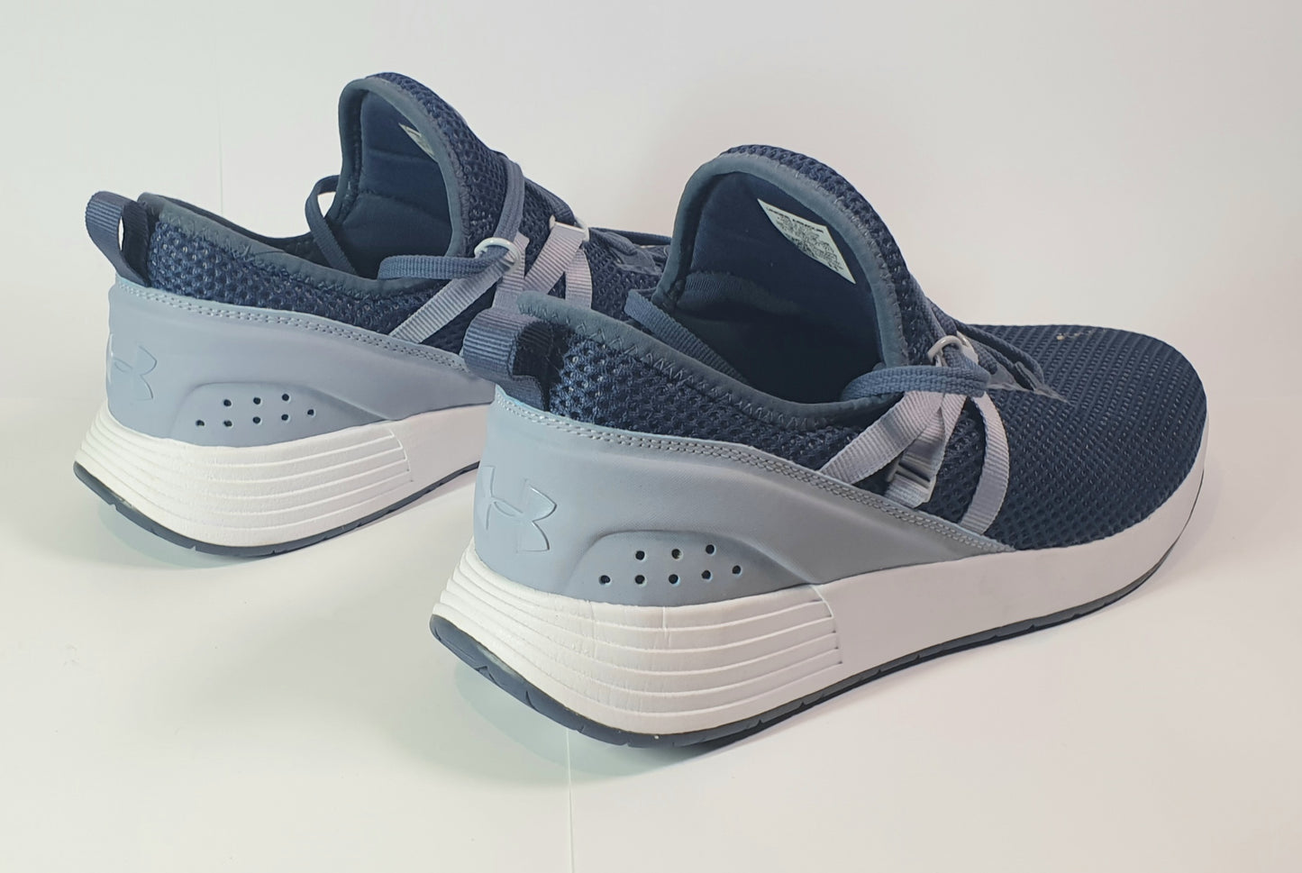 Under Armour Women's Breathe Trainer x NM cross-training shoes in a blue/grey