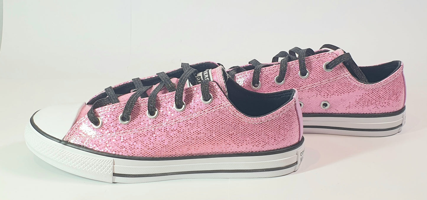 Converse Chuck Taylor All Star low-top sneakers in pink glitter with black laces. Kids