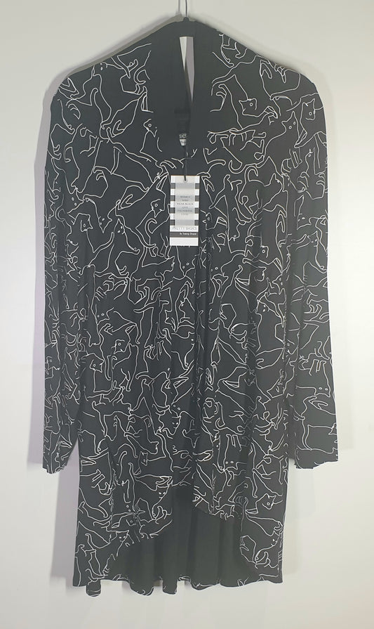 Long dark gray cardigan with white geometric pattern on a hanger against a white background