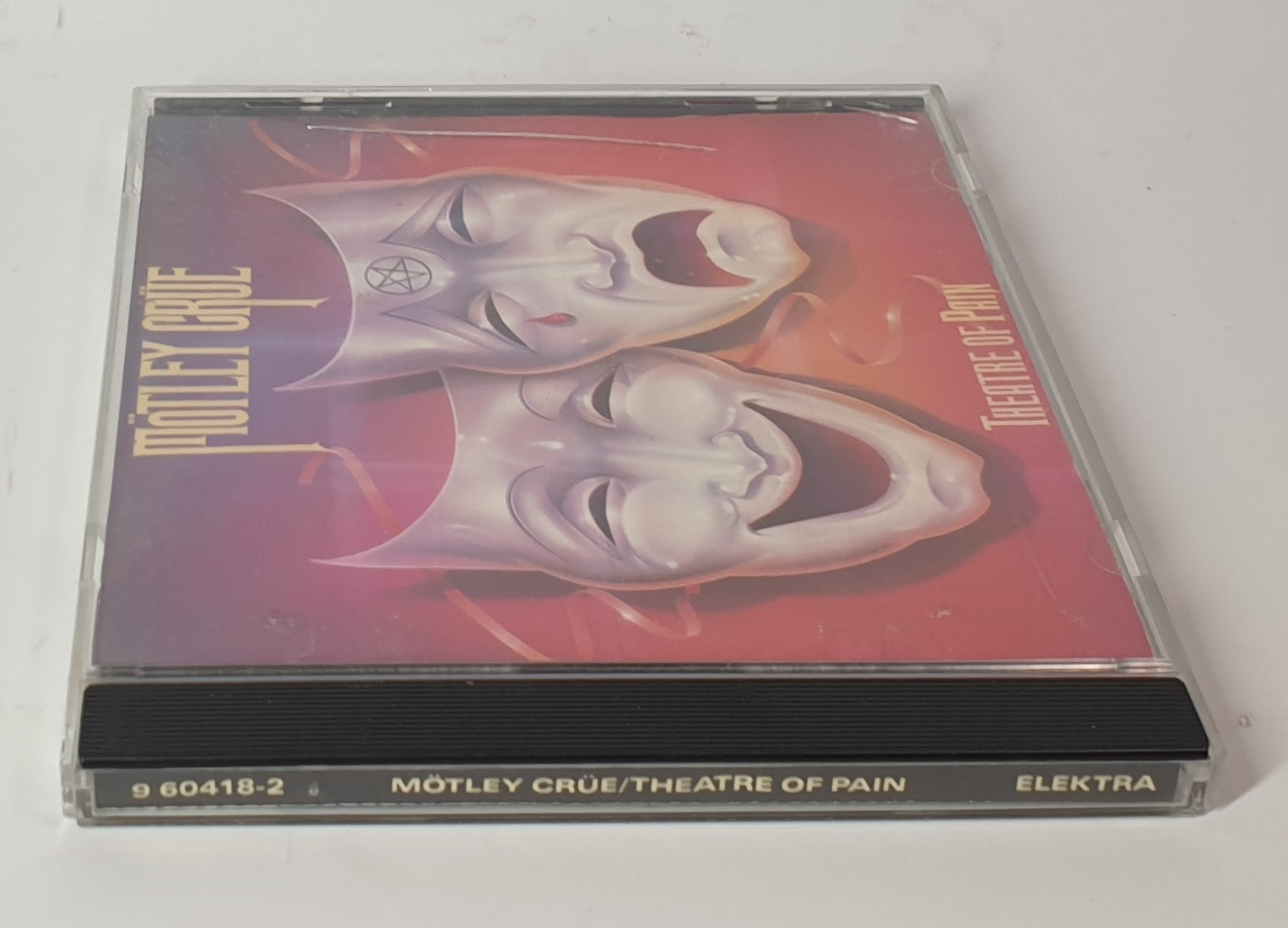 CD cover of 'Theatre of Pain' by Mötley Crüe on a white background
