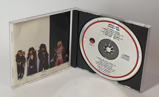 CD with cover featuring a band's image on a white background MOTLEY CRUE