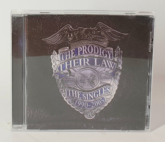 CD cover of 'Their Law: The Singles 1990-2005' by The Prodigy on a white background