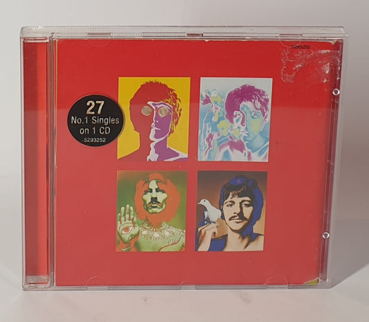 CD cover with colorful portraits and '27 No.1 Singles on 1 CD' label
