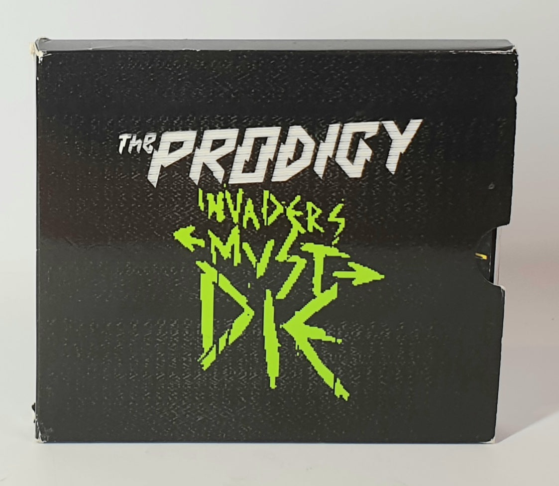 Black album cover with 'The Prodigy' and 'Invaders Must Die' text