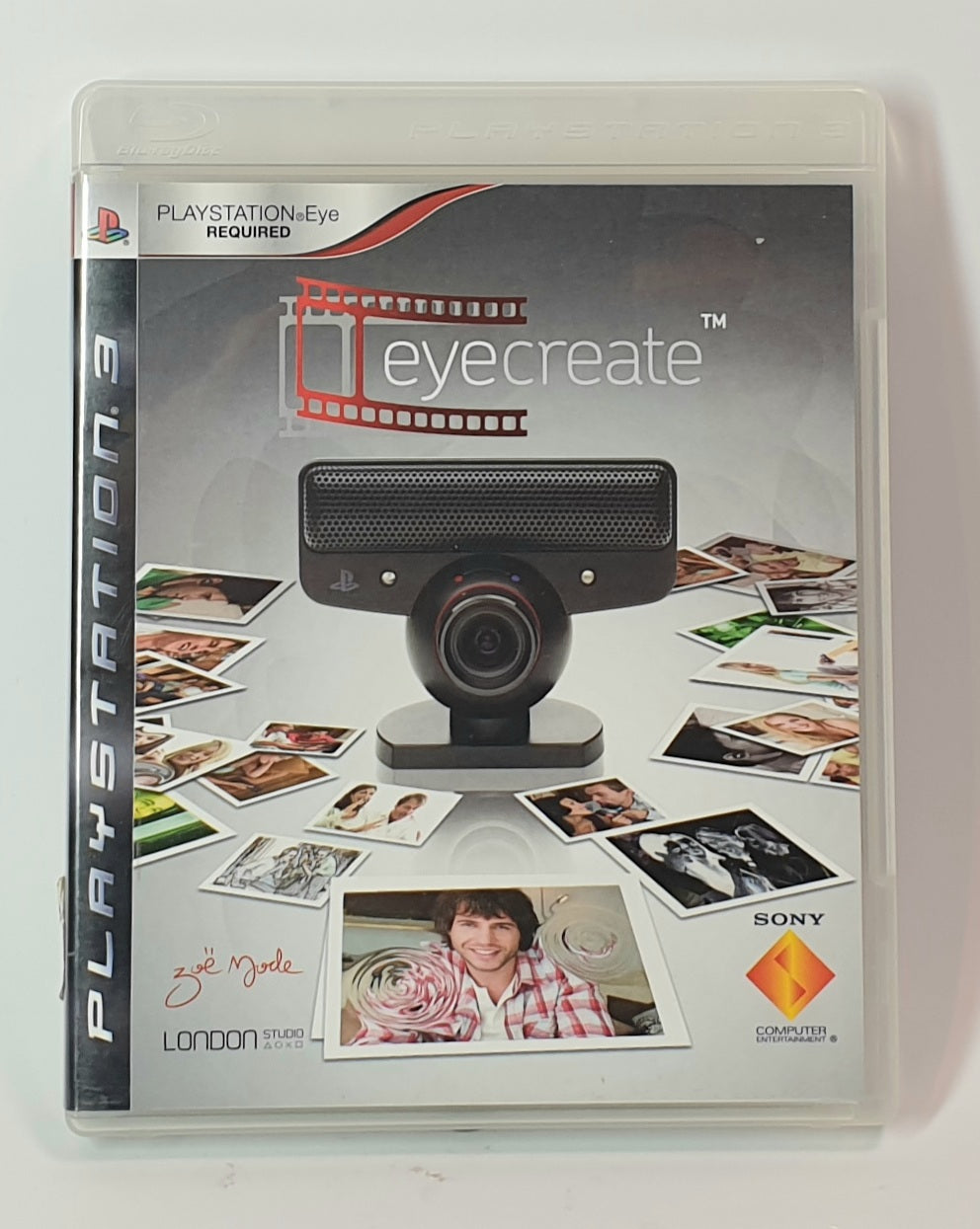 PlayStation EyeCreate packaging with webcam and photo collage on a white background