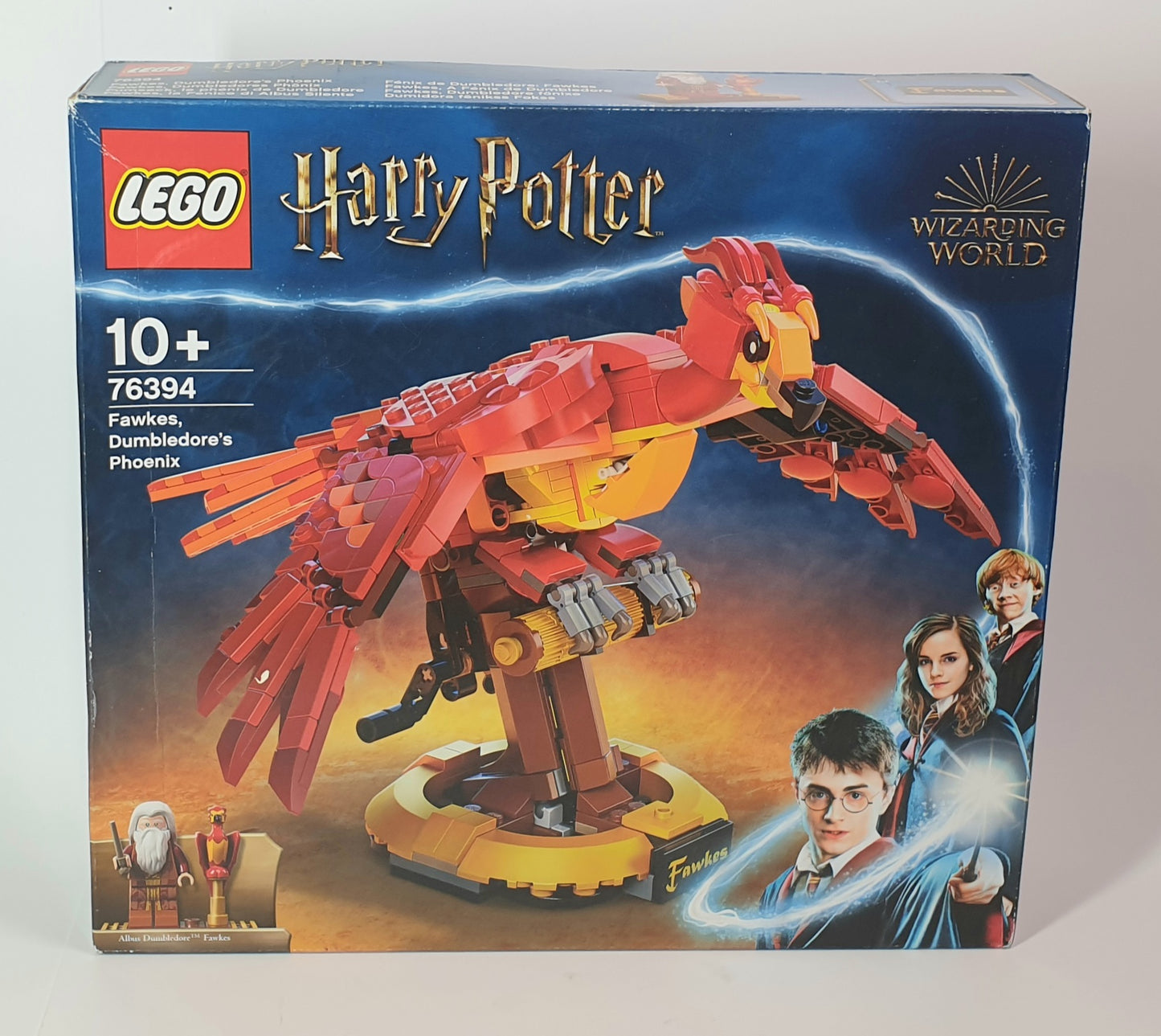 LEGO Harry Potter Fawkes box with characters on a blue and orange background