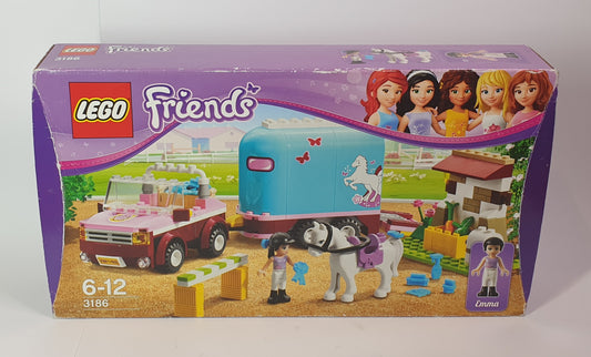 LEGO Friends toy set packaging with a purple border and character illustrations.