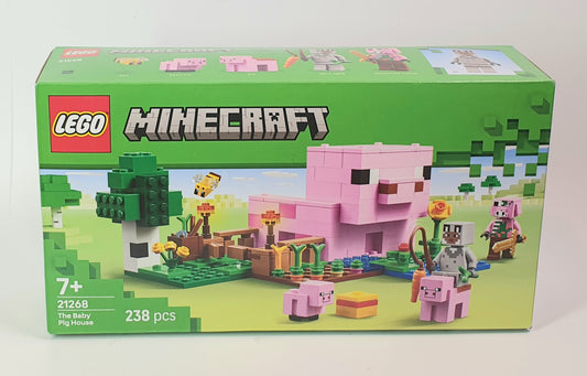 LEGO Minecraft set packaging with a pink pig figure on a green background