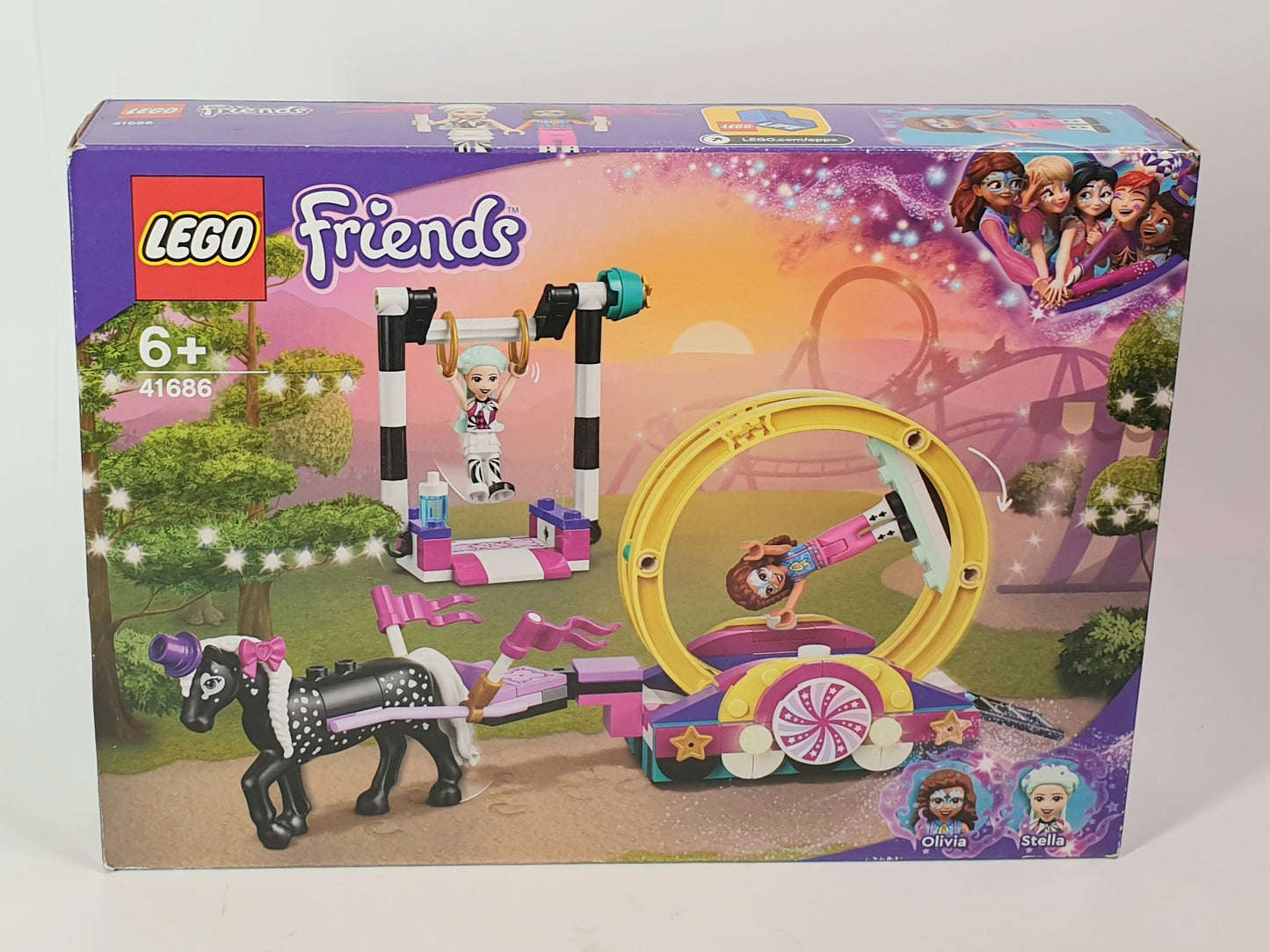 LEGO Friends toy set packaging with cartoon characters and a horse on a white background